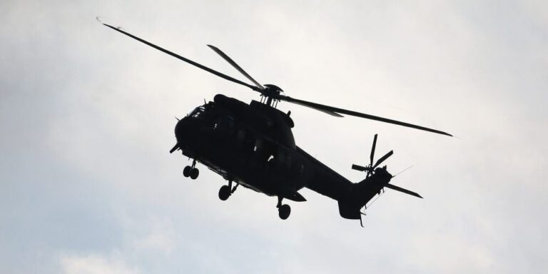 The current image has no alternative text. The file name is: heli.jpg