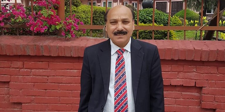 The current image has no alternative text. The file name is: dinesh-tripathi-1.jpg