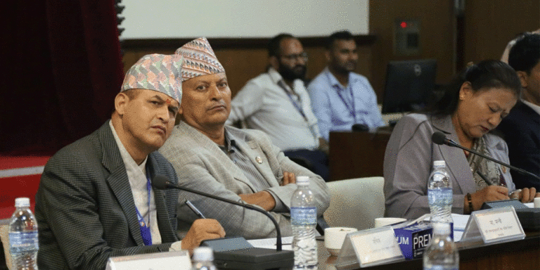 The current image has no alternative text. The file name is: adhikari.gif