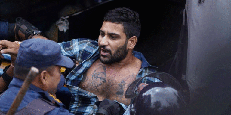The current image has no alternative text. The file name is: santosh-arrested.gif