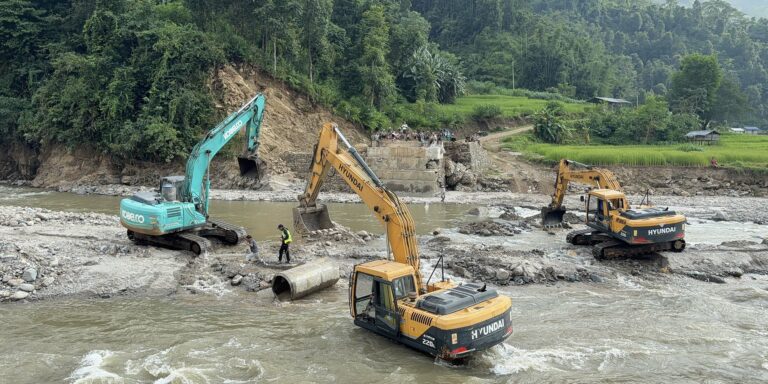 The current image has no alternative text. The file name is: dozer-scaled.jpg