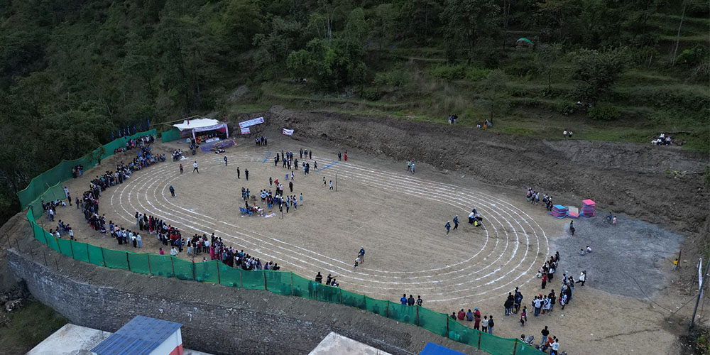 म्याग्दीको लाम्पाटामा पाखो सम्याएर खेलमैदान निर्माण