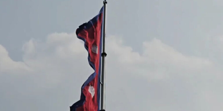 The current image has no alternative text. The file name is: nepali-flag.jpg