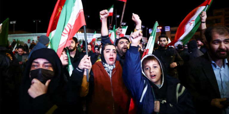 The current image has no alternative text. The file name is: iran-celebrat.jpg