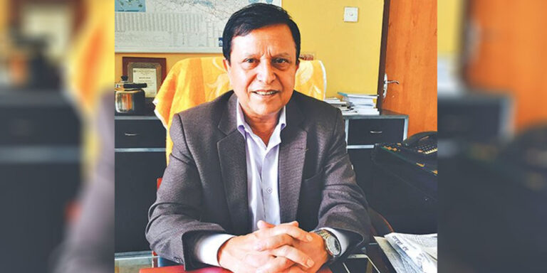 The current image has no alternative text. The file name is: adhikari.jpg
