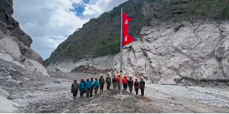 The current image has no alternative text. The file name is: nepali-flag.jpg